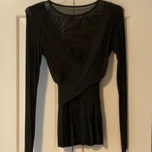 stylish long sleeve black layered top with mesh inserts in front and back.